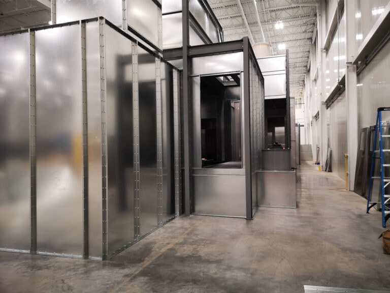 System construction — booth panels being assembled
