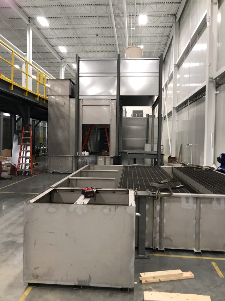 System construction — water wash sump and booth framing