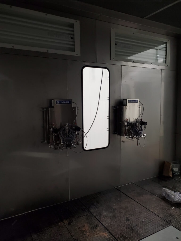 System construction — spray gun wall panel with Graco equipment