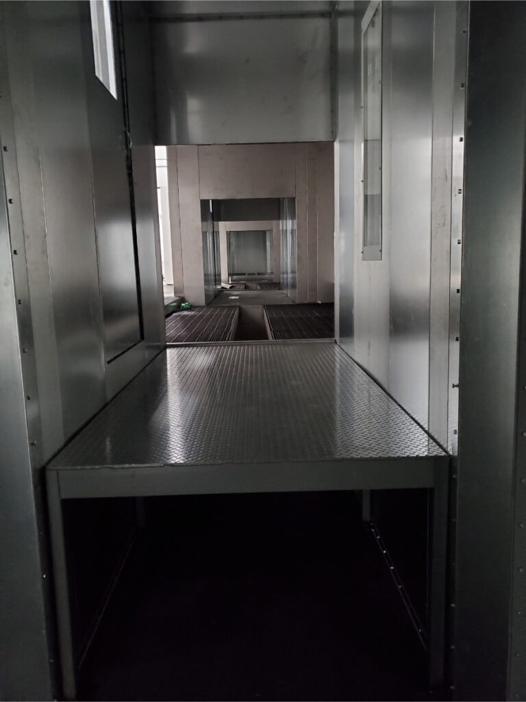 System construction — booth tunnel interior perspective view