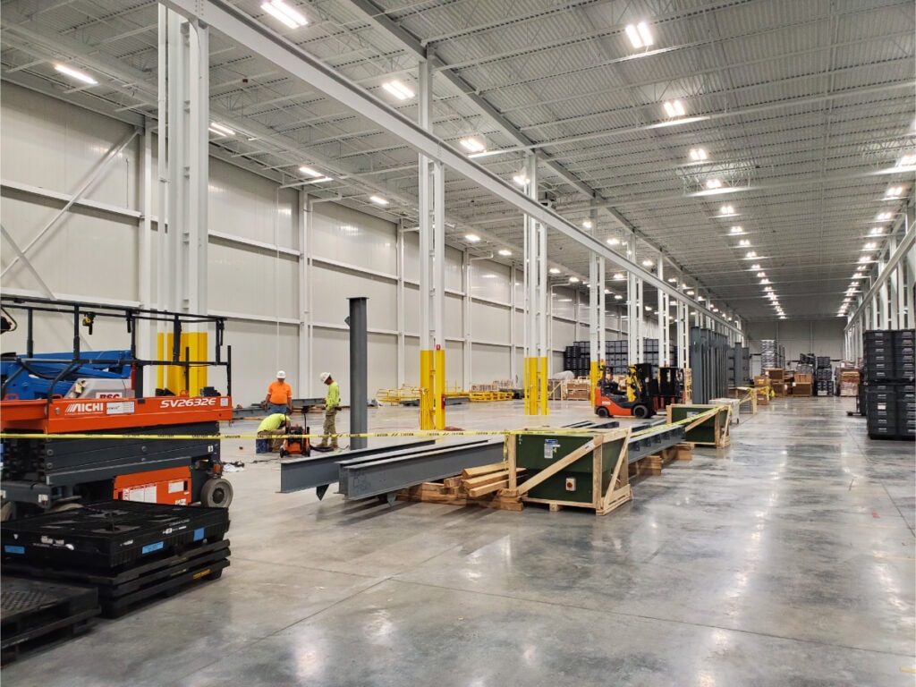 System construction — beams being staged
