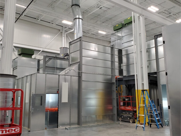 System construction — completed spray booth exterior in facility