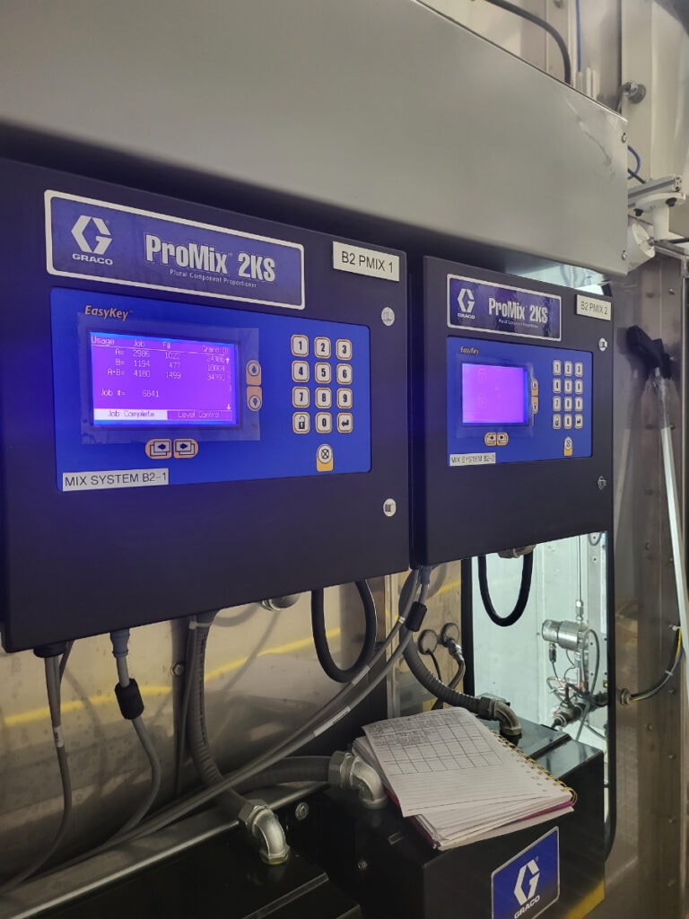 System construction — Graco ProMix 2KS plural component proportioners installed